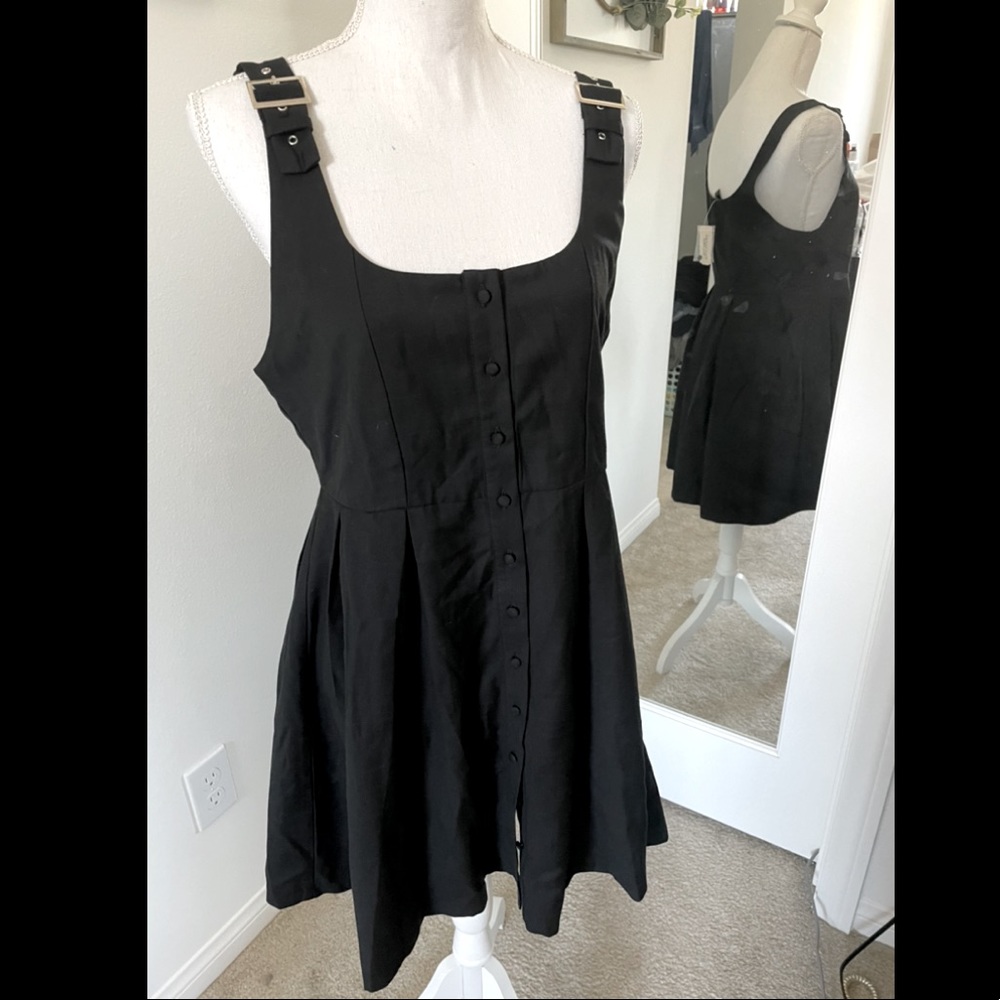 Black button up mini dress with buckle straps